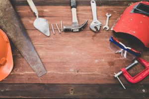 pexels photo 1029243 1029243 Flat lay of various workshop tools on a rustic wooden table, showcasing DIY essentials.